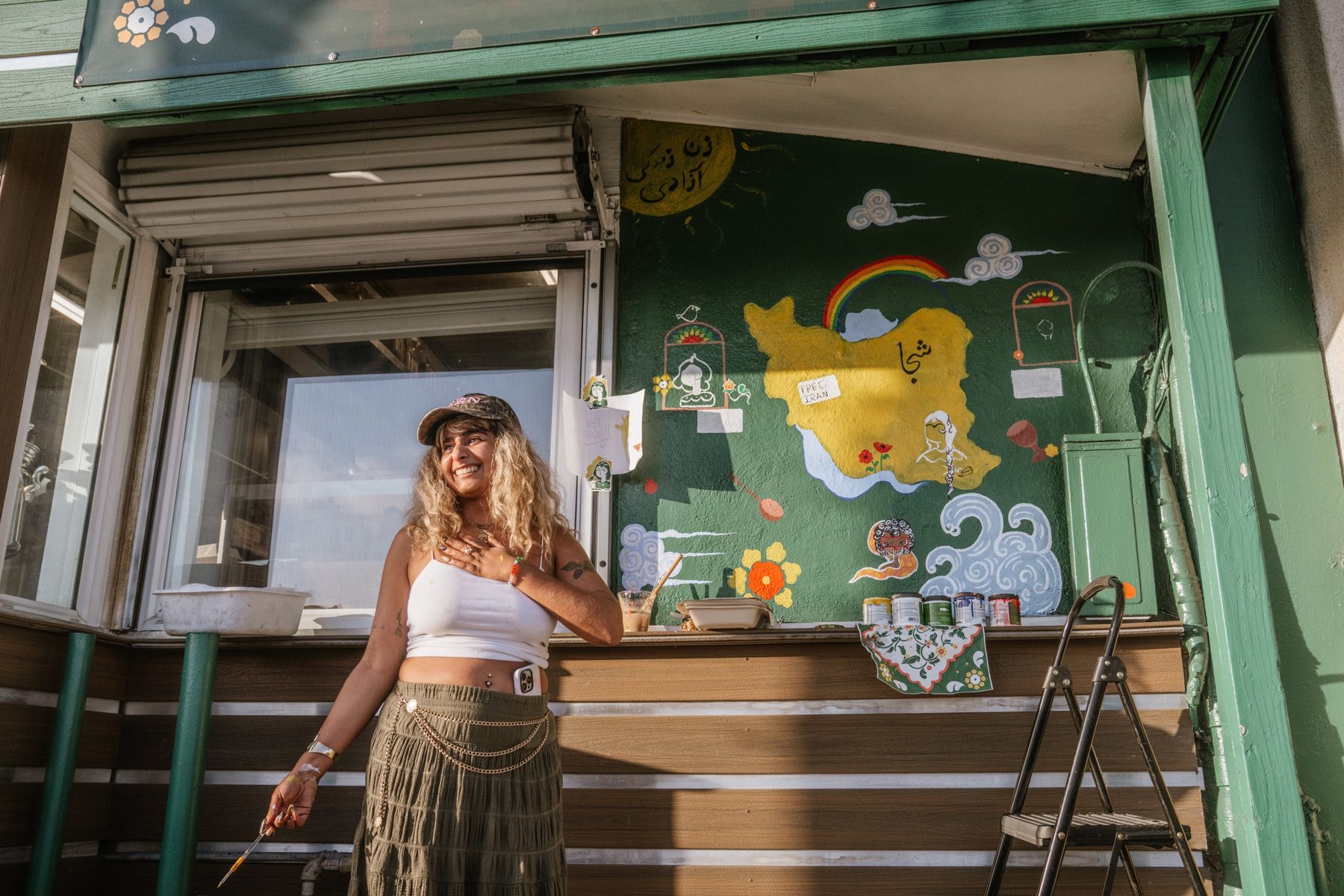 Painting the mural on the cafe wall